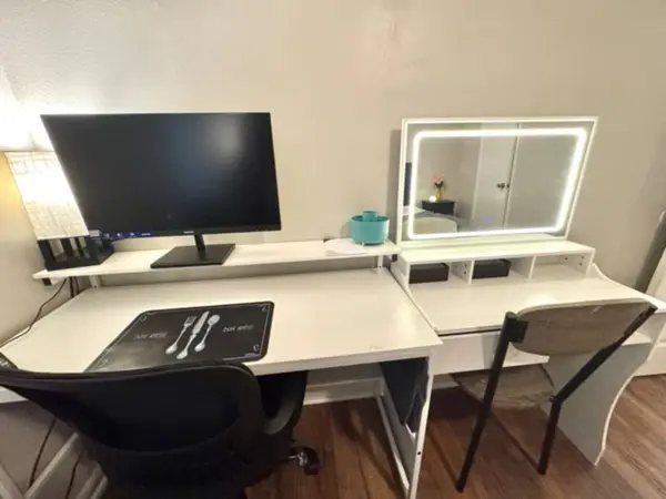 Dedicated workspace with a monitor and desk chair